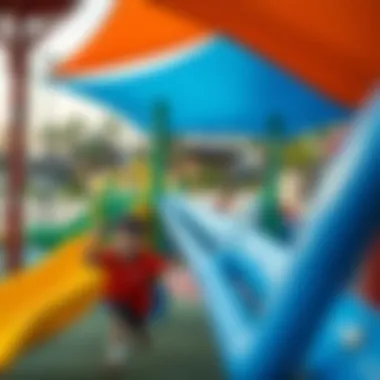 Children's Playground at Al Jaddah Park Children playing joyfully in a vibrant playground