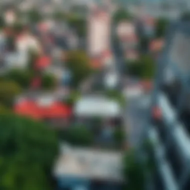 Aerial Perspective of H Residence's Vibrant Neighborhood Aerial view of the surrounding neighborhood of H Residence by Huna